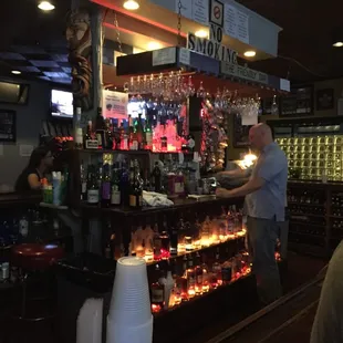 a man standing at the bar