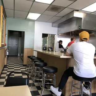 a man sitting at a bar