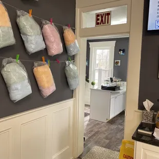 a kitchen with a tv in the background