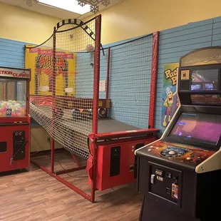 a game room with arcade machines