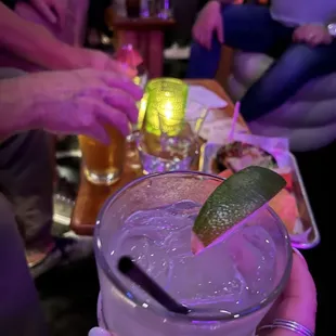 a person holding a drink