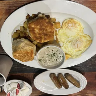 Biscuits and Gravy with eggs and home fries! A side of sausage!