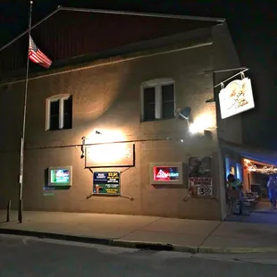 a man standing outside at night