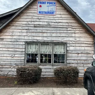 a car parked in front of a restaurant