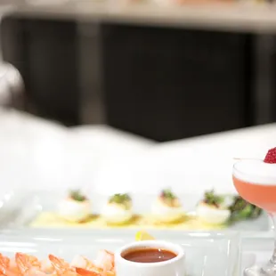 a plate of food and drinks