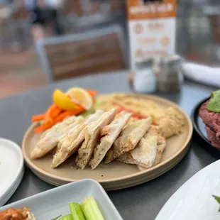 a table with plates of food