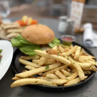a plate of fries and a burger