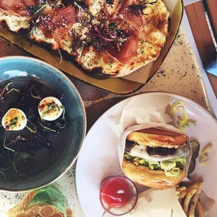 Royale burger, chanterelle prosciutto flatbread, deviled eggs