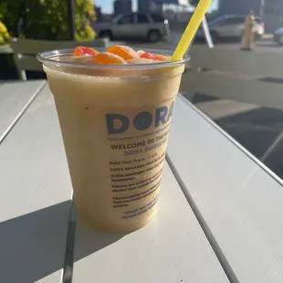 a cold drink with a straw