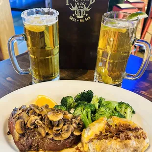 Steak topped with sauteed mushrooms