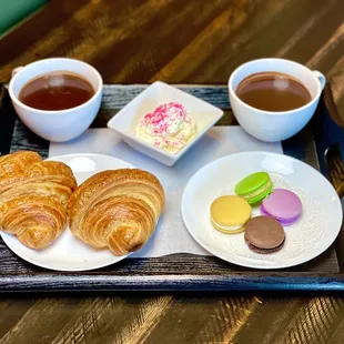 French hot chocolate with croissants to dip and macarons to finish.