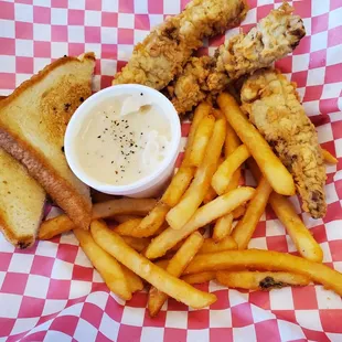 Steak fingers,  Tuttle&apos;s meat, with gravy.