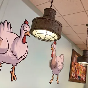 a rooster and a chicken