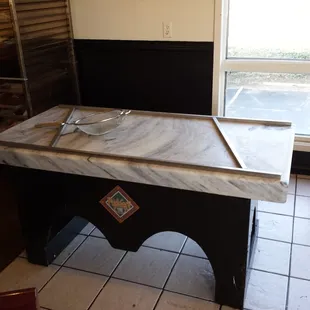 The marble tables where they pour and prepare the fudge.