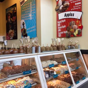a display case filled with pastries