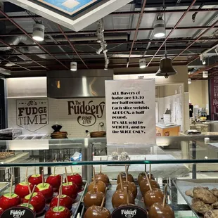 a display case with a variety of desserts