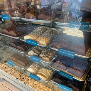 a display case of a variety of pastries