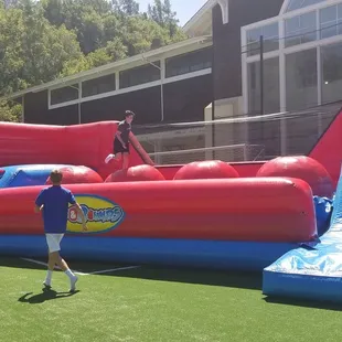 Leap across 4 Giant Balls as fast as you can if you can  on this huge 40' x 20' inflatable