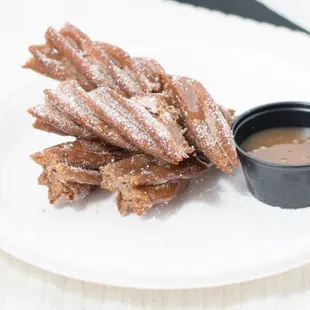 Churro with caramel sauce