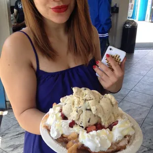 Funnel Cake  with fresh strawberries cookies n cream whip cream and lechera