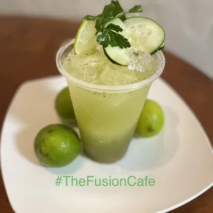 a drink with lime and cucumber