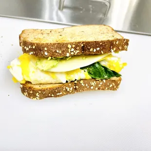 a sandwich on a cutting board