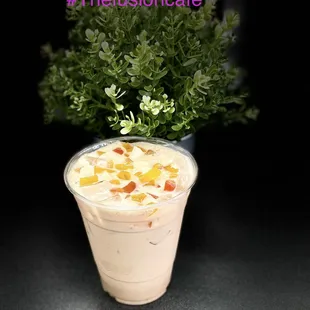 a smoothie in a plastic cup