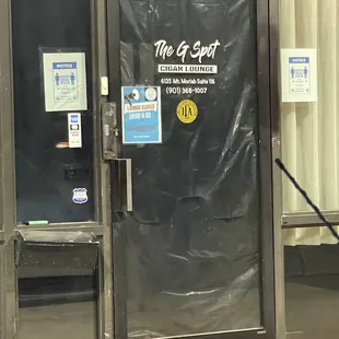 the front door of a restaurant