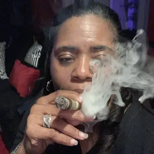 a woman smoking a cigarette