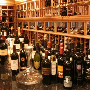 a wine cellar full of wine bottles