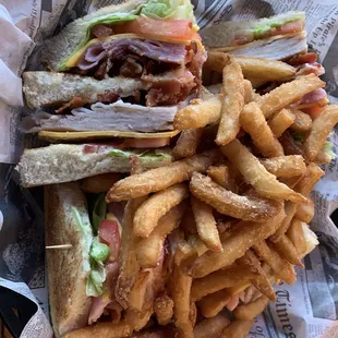 Club sandwich with fries