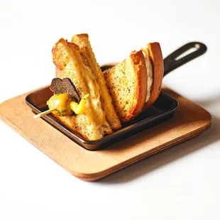 a grilled sandwich in a pan