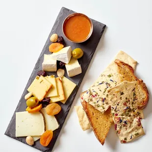 a plate of cheese and crackers