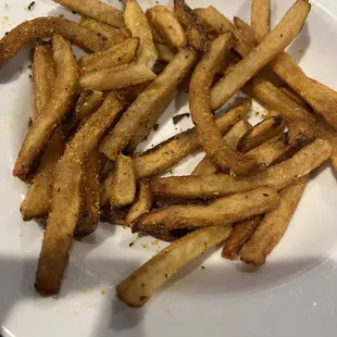 Lemon pepper fries. Soggy, mushy. Basically frozen French fries that were thrown in the deep fryer. Cheap Lemon pepper seasoning.