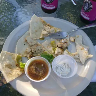 Pepper jack quesadilla with little cheese to be found.