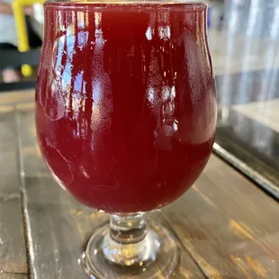 a glass of beer on a table