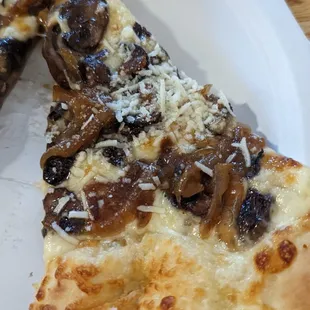 BYO roasted mushrooms, caramelized onions, truffle oil and romano cheese