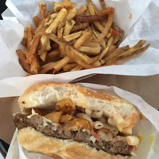 Garbage Burger (stuffed with bacon, meat sauce, onions, Mac n cheese salad, and fries!) with a side of fries. Decently good.