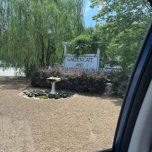 a view of the garden from a car window