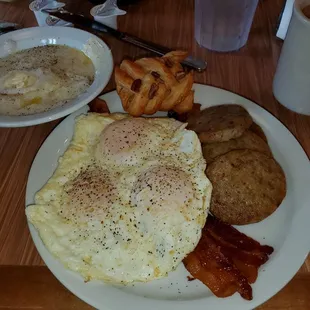 My favorite: 3 perfect "Victoria" eggs over easy, 4 sausage, 4 bacon, grits, small Danish, &amp; pot of coffee.