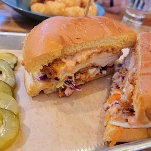 Fried chicken sandwich, pickles on the side