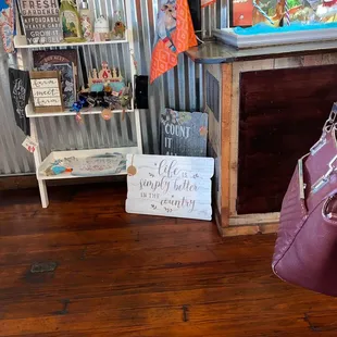a woman holding a purple purse