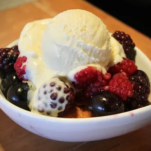 Donuts with Flambeed Berries and Housemade Vanilla Ice Cream