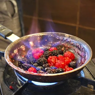 Donuts with Flambeed Berries and Housemade Vanilla Ice Cream