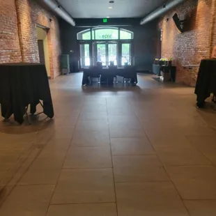 a large room with tables and chairs