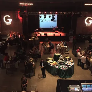 a crowd of people sitting at tables