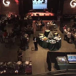 a crowd of people sitting at tables