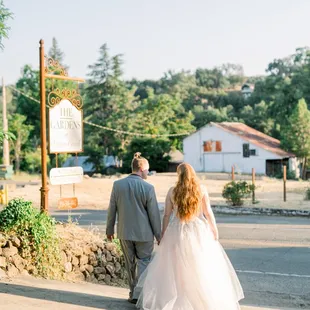 Incredible walking away shot with The Gardens sign at my wedding.