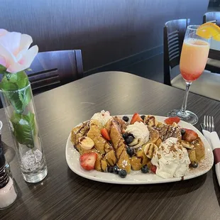 a plate of food and a drink