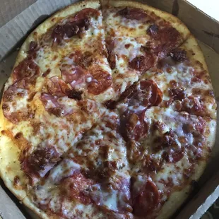 Care could not be taken to slice properly. Also this is extra cheese and 4 toppings. Do you see any of that?